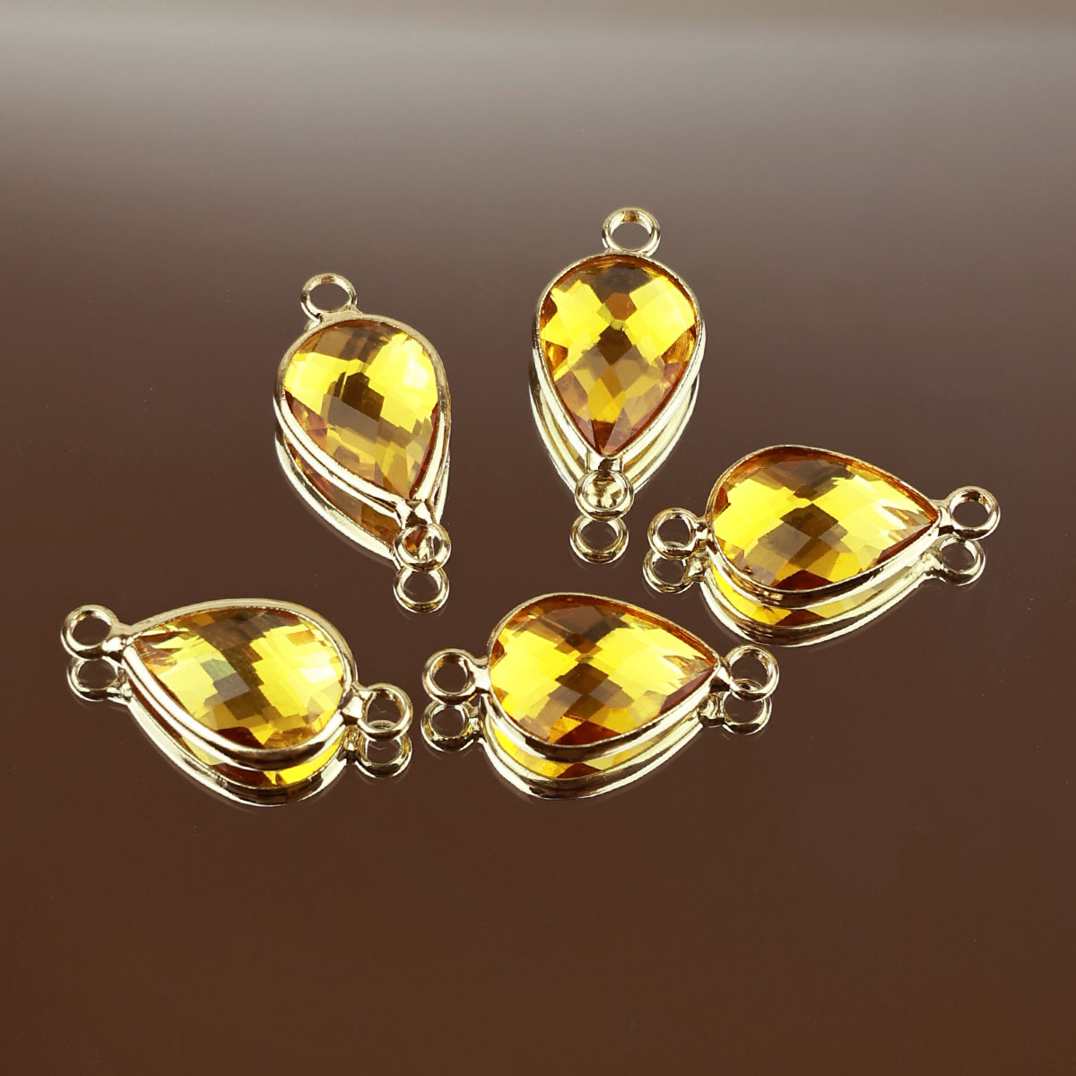 Подвеска (соединитель для бижутерии) (уп. 10шт) капля прозрачная 10*14 мм 018 желтый